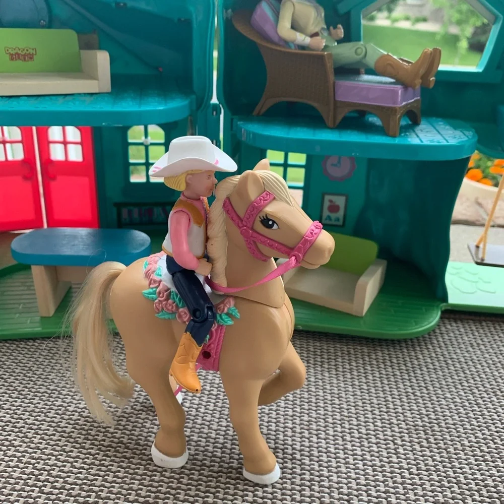 Cowgirl dolls, horse, house, and furniture playset